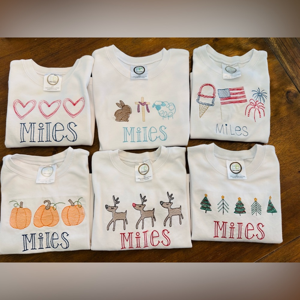 6 holiday embroidered tees with the name “Miles”. Play condition. Sizes 3T-4T.
